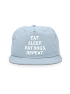 Eat. Sleep. Pat Dogs. Repeat. Quick-Dry Cap