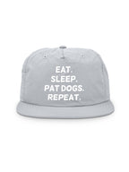 Eat. Sleep. Pat Dogs. Repeat. Quick-Dry Cap
