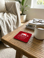 Tasmanian Devil Christmas Edition Red coaster in a coffee scene